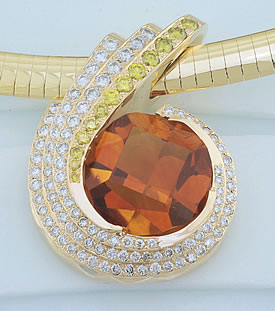 This pendant features a 20-carat orange citrine surrounded by 88 yellow and white round diamonds set in a 14k yellow gold setting